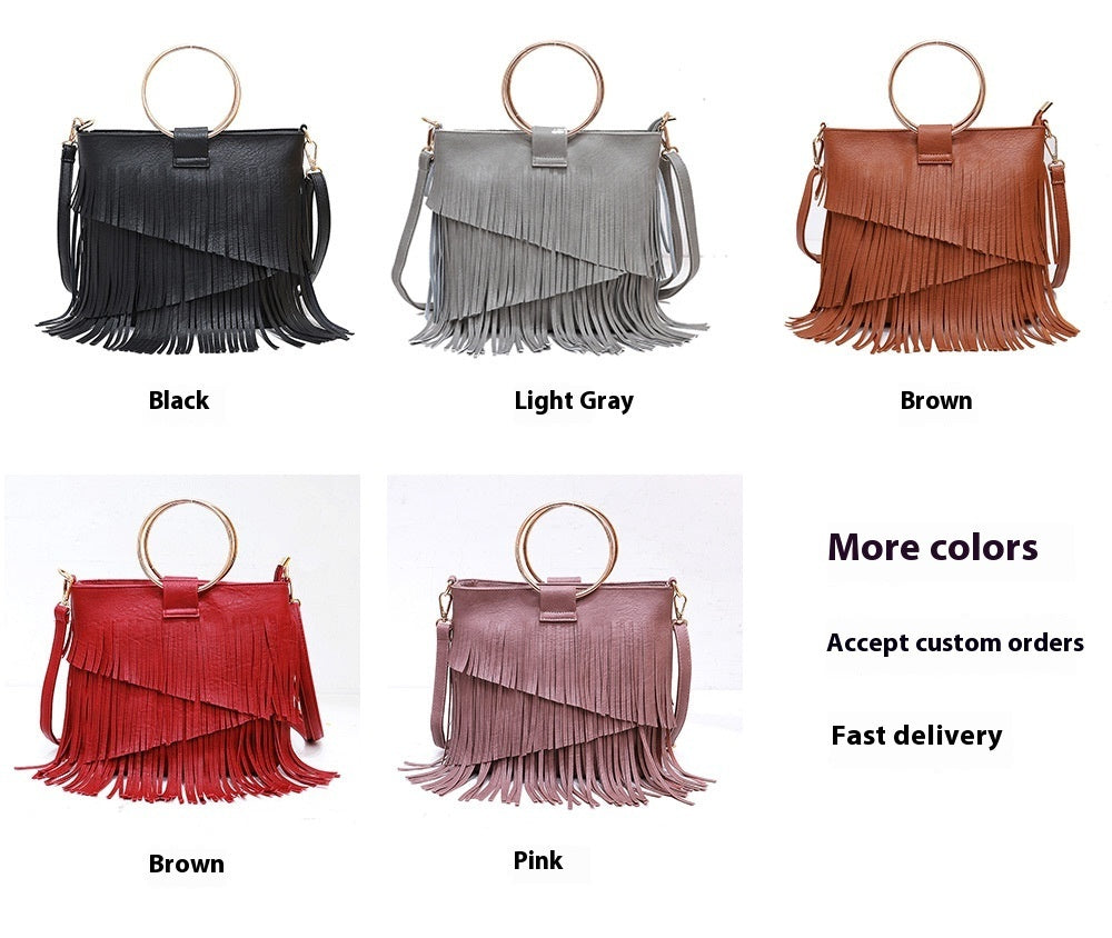 Iron Portable And Fashion New Irregular Tassel Bag with wristlet ring