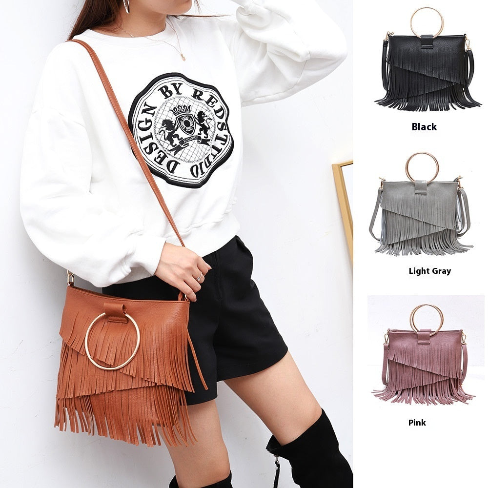 Iron Portable And Fashion New Irregular Tassel Bag with wristlet ring